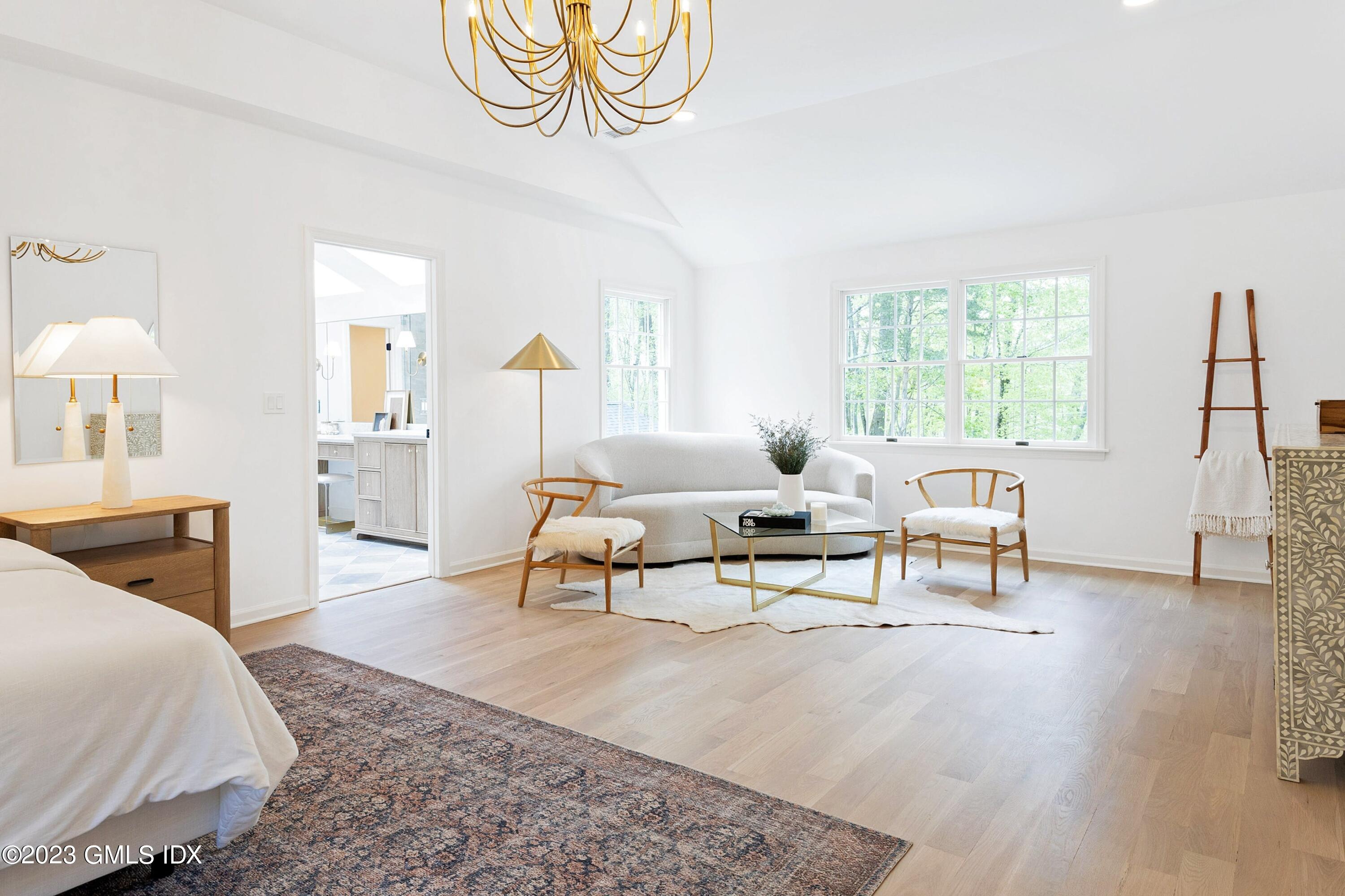 48 Old Mill Road Greenwich, CT 06831 - Photo 22 of 47 a living room with furniture and a large window