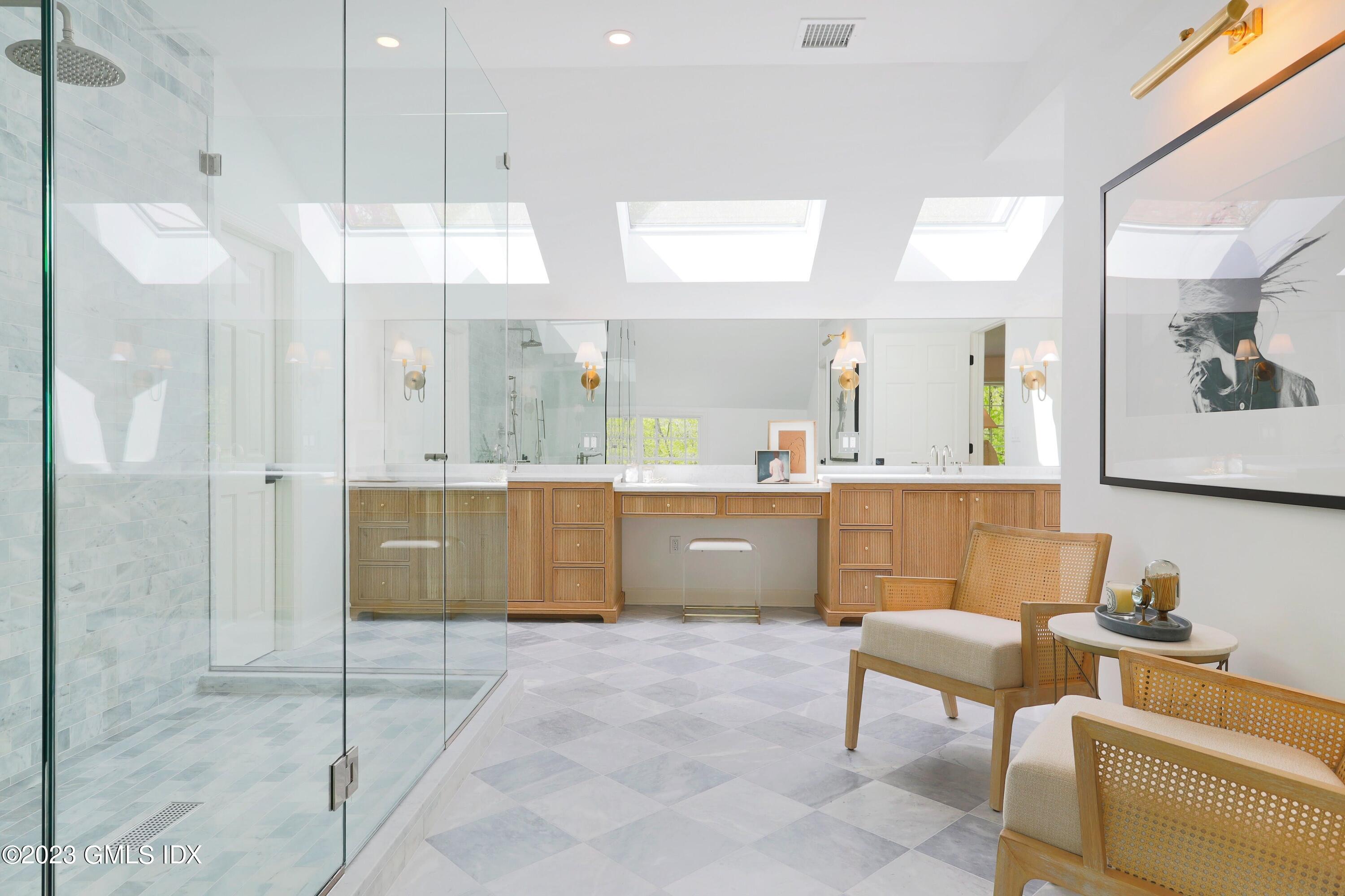 48 Old Mill Road Greenwich, CT 06831 - Photo 24 of 47 a large bathroom with a large tub shower and sink