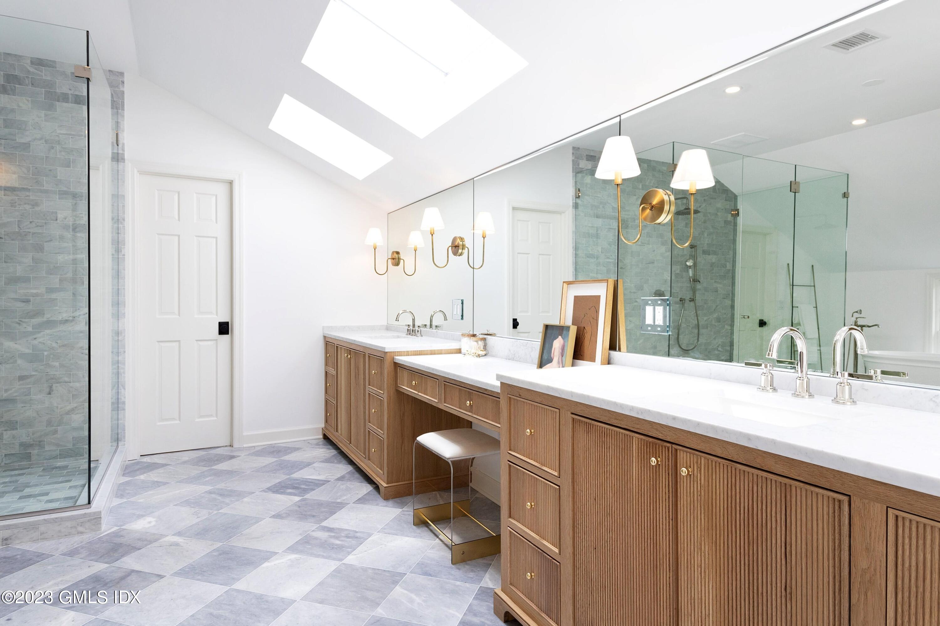 48 Old Mill Road Greenwich, CT 06831 - Photo 25 of 47 a spacious bathroom with a double vanity sink mirror and double