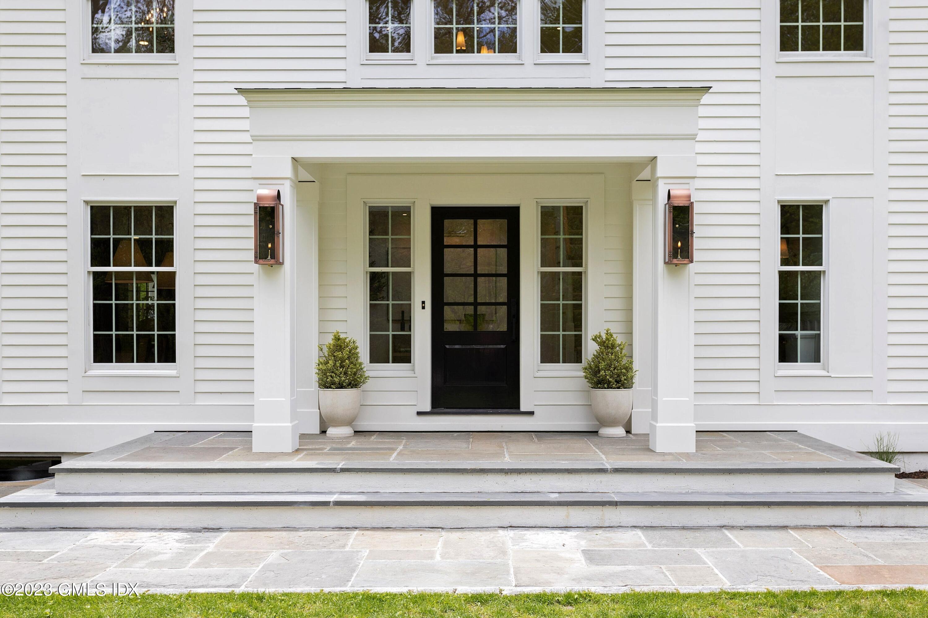 48 Old Mill Road Greenwich, CT 06831 - Photo 3 of 47 a front view of a house