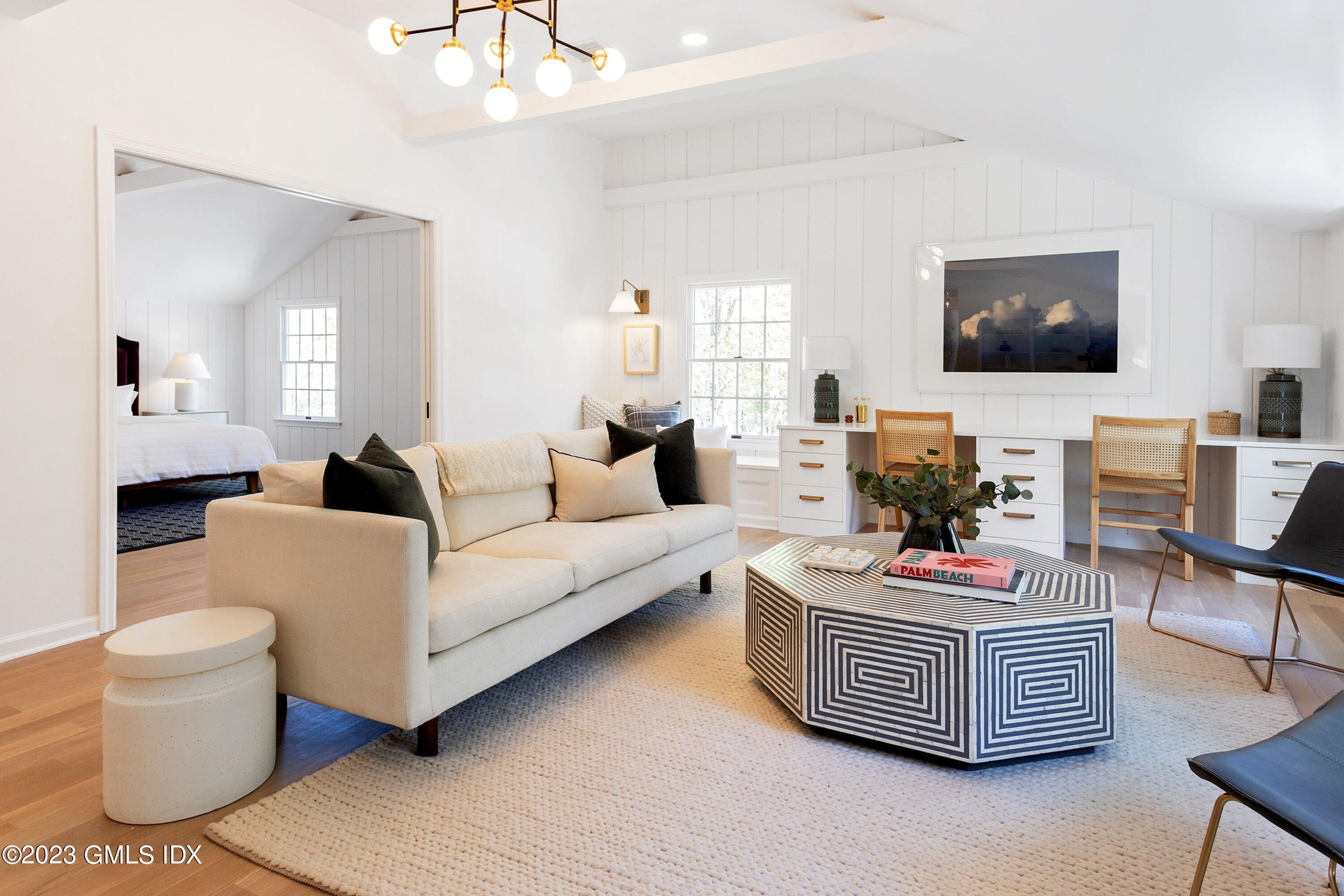 48 Old Mill Road Greenwich, CT 06831 - Photo 36 of 47 a living room with furniture and a flat screen tv