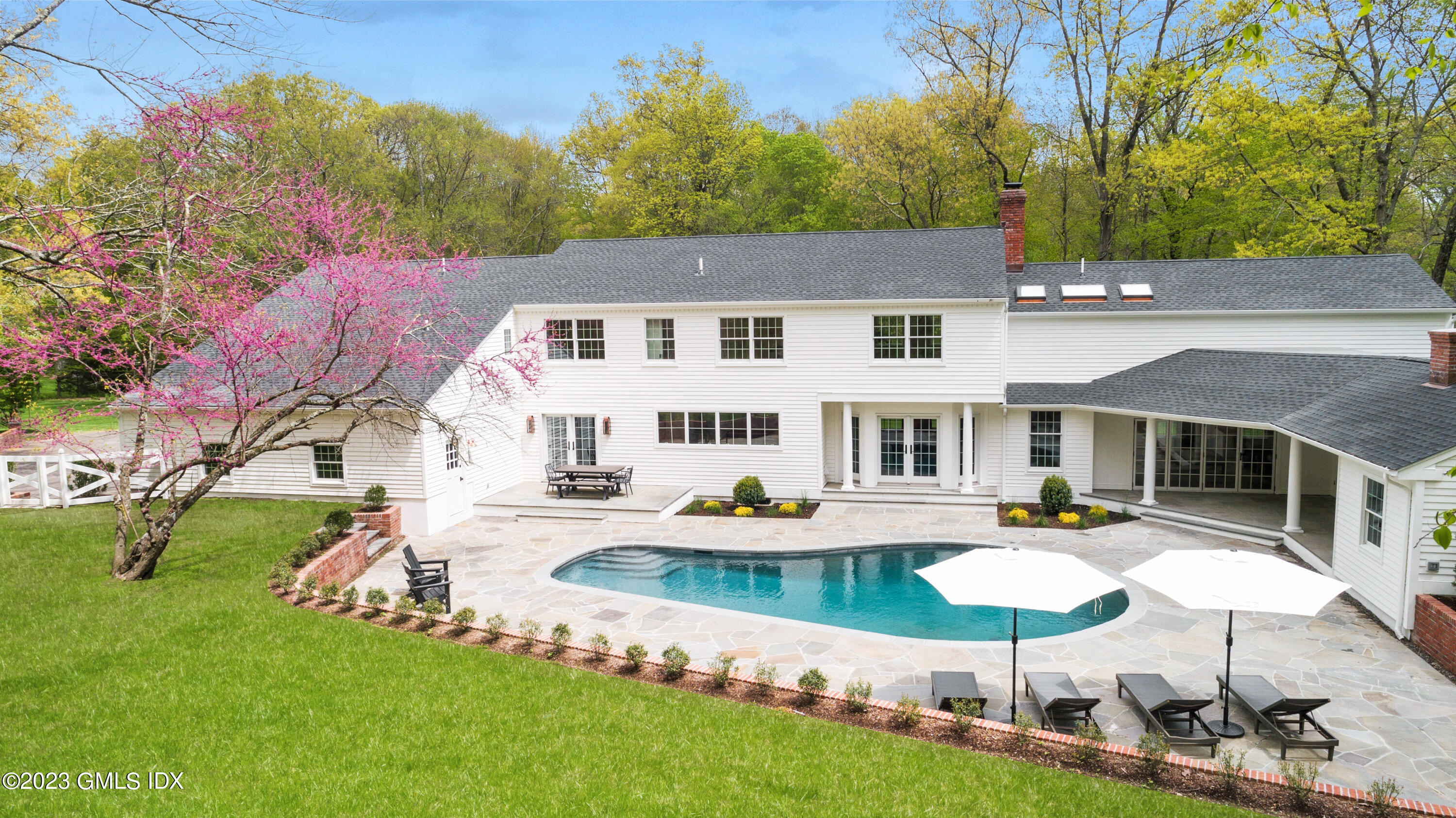 48 Old Mill Road Greenwich, CT 06831 - Photo 42 of 47 an aerial view of a house with swimming pool and porch