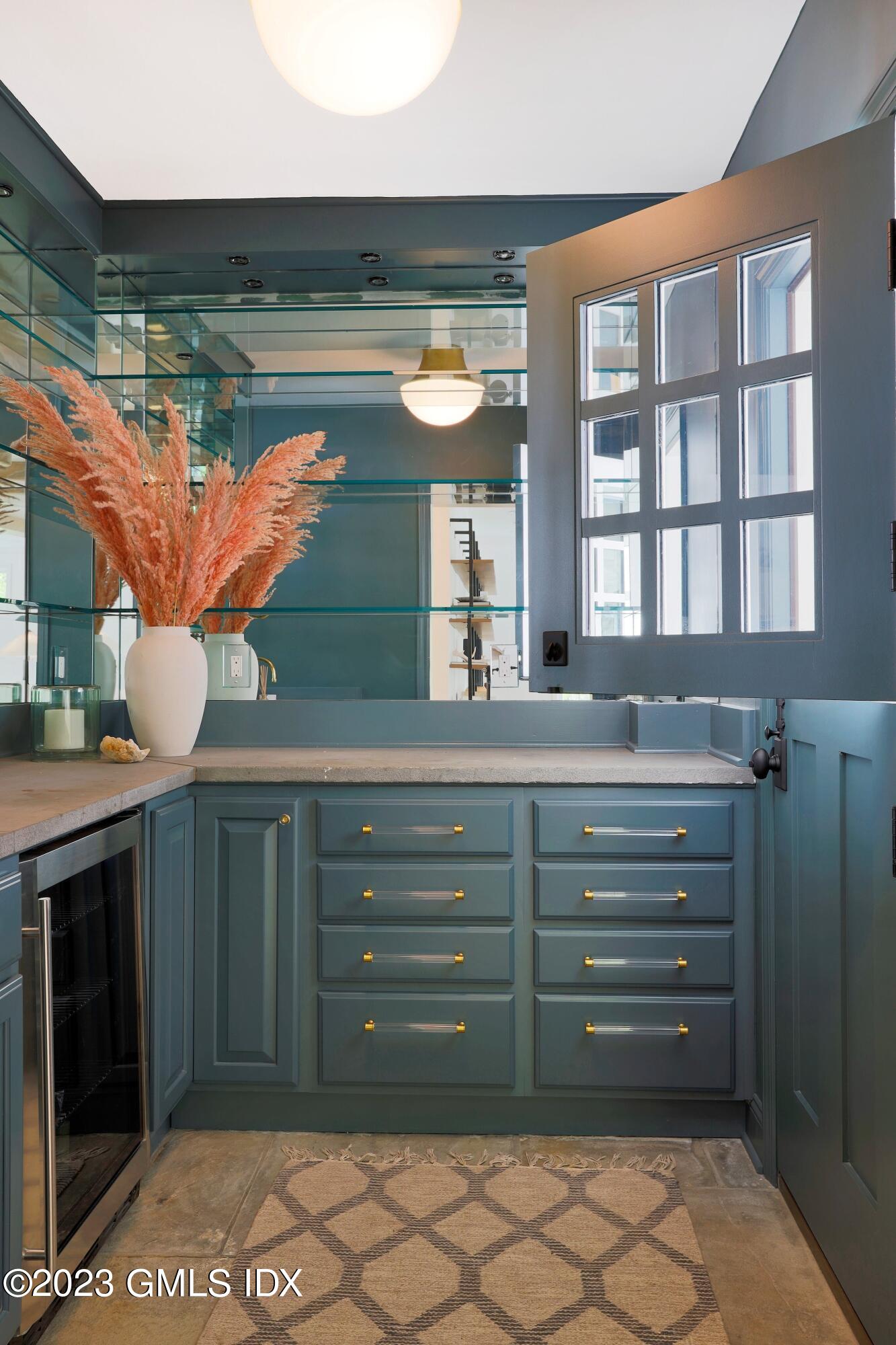 48 Old Mill Road Greenwich, CT 06831 - Photo 10 of 47 a bathroom with a sink and a mirror