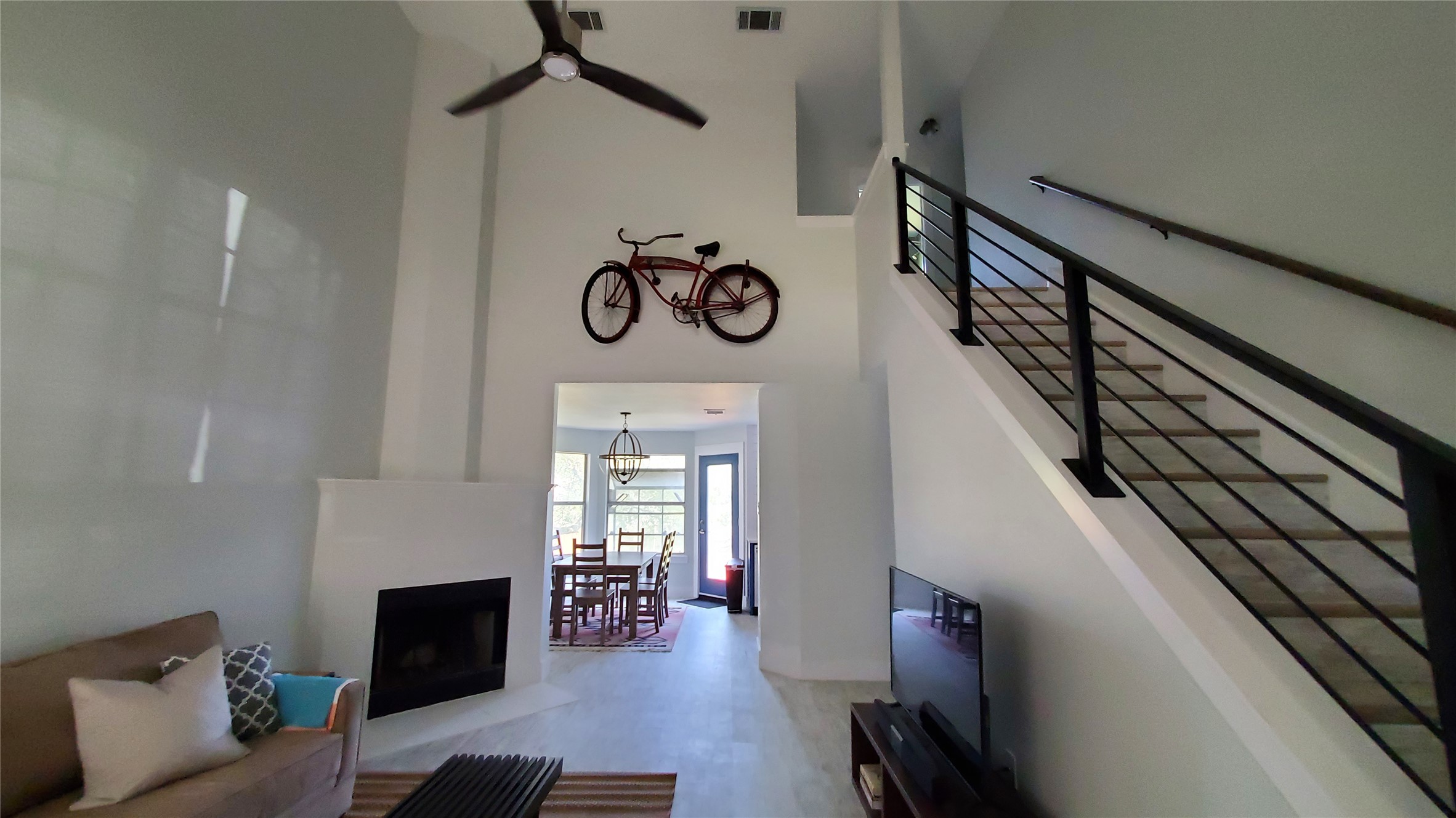 10201 Sandy Beach Road Dripping Springs, TX 78620 - Photo 12 of 13 a view of entryway livingroom and hall with wooden floor
