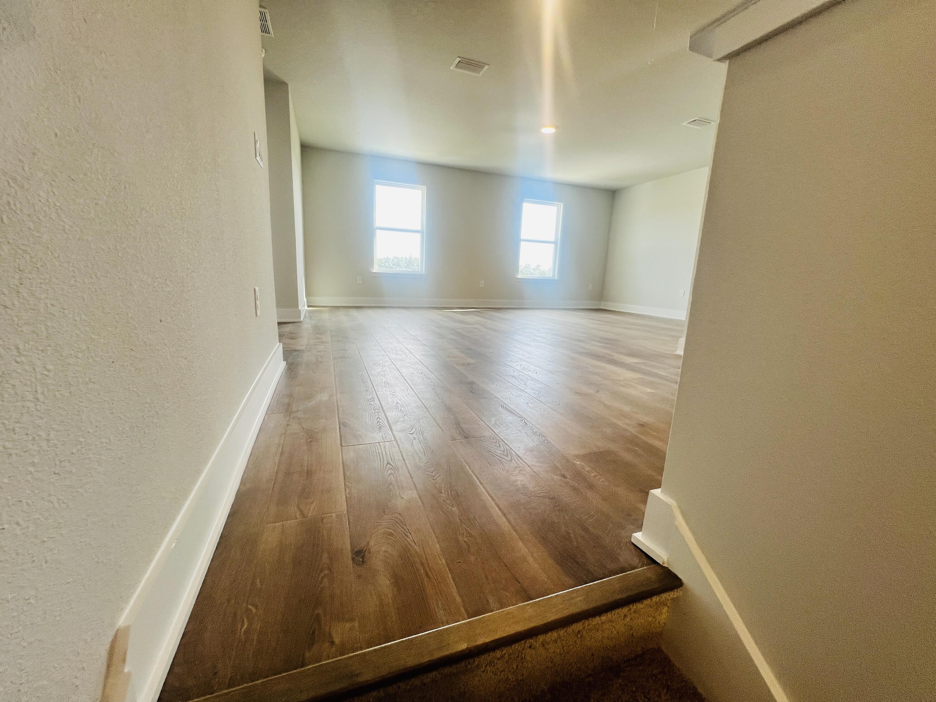 5299 Hidden Pines Circle Milton, FL 32583 - Photo 21 of 33 a view of livingroom with wooden floor