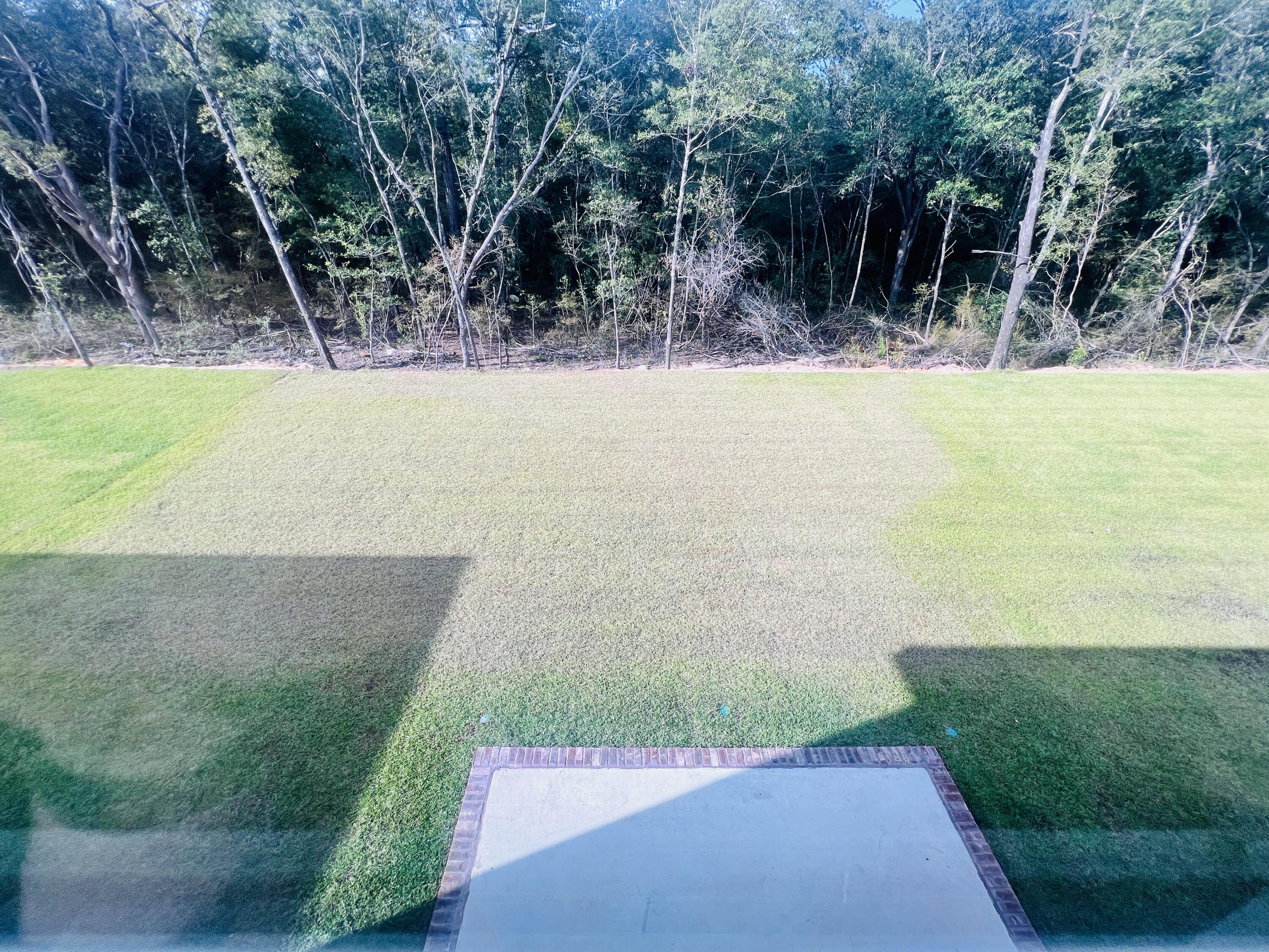 5299 Hidden Pines Circle Milton, FL 32583 - Photo 33 of 33 a view of an outdoor space and a yard