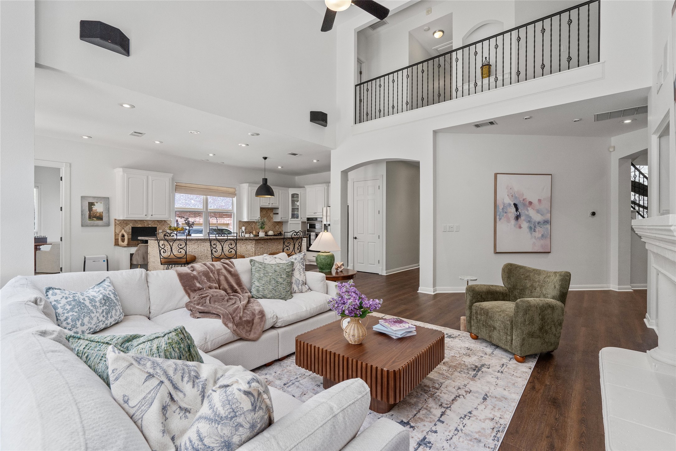 4313 Rio Robles Drive Austin, TX 78746 - Photo 10 of 40 An inviting open-concept living area with soaring ceilings and a stylish, versatile layout.
