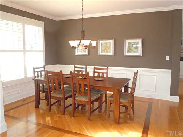 LOTS OF ROOM FOR GUESTS IN THIS LARGE OPEN DINING ROOM...NOTE THE HARDWOOD FLOOR WITH WALNUT INLAY. Dining Room