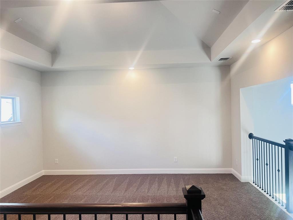 6825 Entwistle Road Frisco, TX 75034 - Photo 17 of 33 a view of room with racks on the wall
