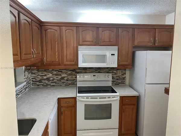 $220,000 | 3252 Foxcroft Road, Unit 206, Miramar, FL 33025