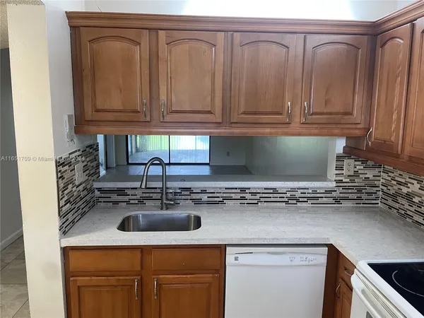 $220,000 | 3252 Foxcroft Road, Unit 206, Miramar, FL 33025