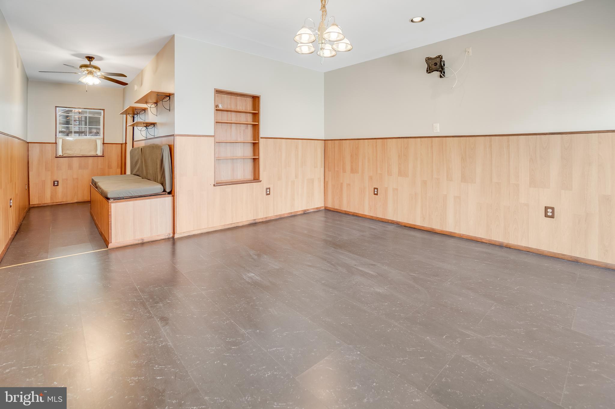3006 Elliott Street Baltimore, MD 21224 - Photo 16 of 22 Large Rec Rm with Laminate Floors
