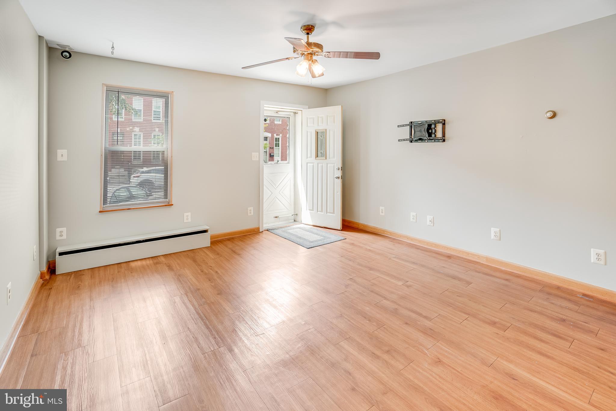 3006 Elliott Street Baltimore, MD 21224 - Photo 3 of 22 Laminate Floors throughout main Level
