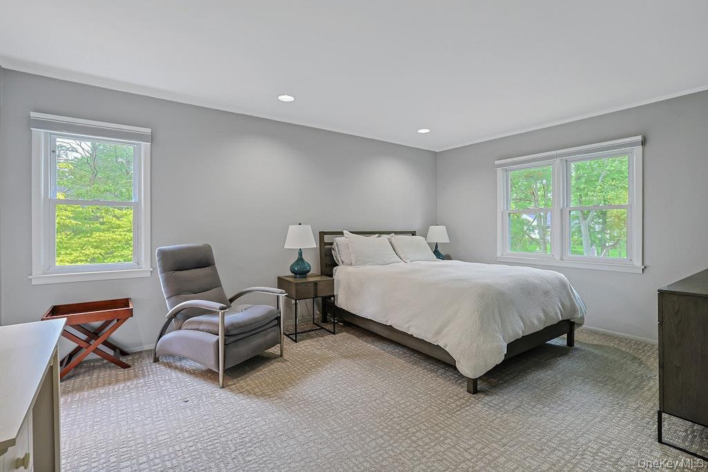 305 Stratton Road New Rochelle, NY 10804 - Photo 18 of 32 a bedroom with a bed chair and window