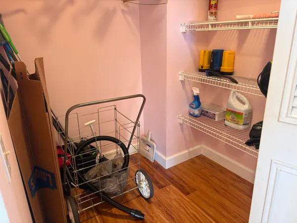 a close view of light fixtures and wooden floor