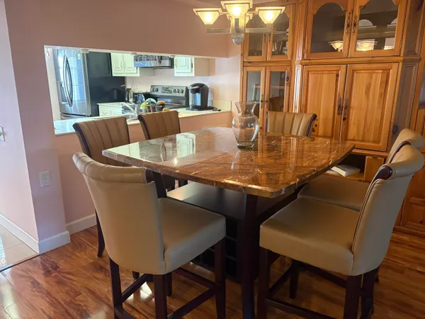 a view of a dining room with furniture