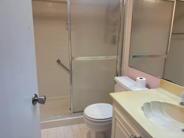 a bathroom with a sink and toilet