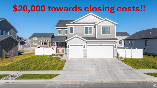 1077 Postmark Place Eagle Mountain, UT 84005 - Photo 1 of 1 Craftsman-style home with a gate, a garage, concrete driveway, and a residential view