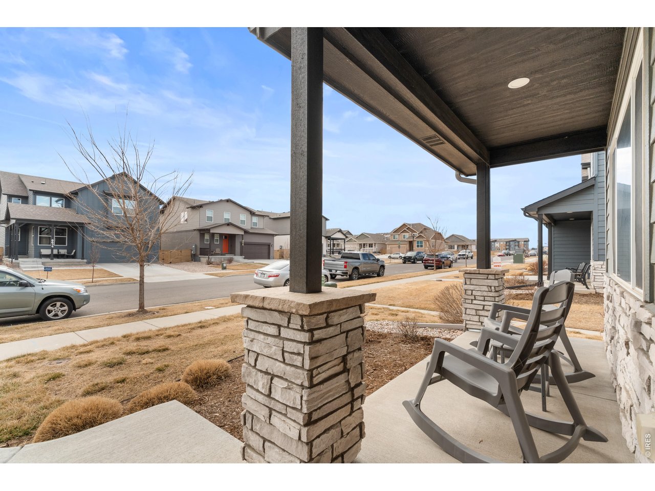 6611 4th Street, Unit 1 Greeley, CO 80634 - Photo 6 of 48 Front Porch and HOA maintained landscaping.