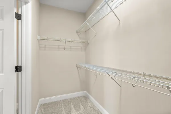 a view of a room with racks on the wall