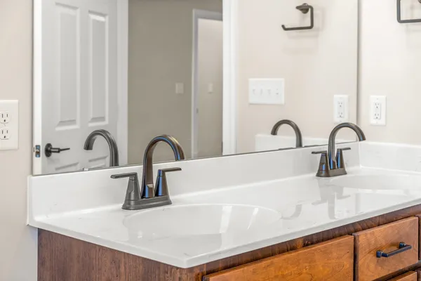 a bathroom with a sink and a mirror