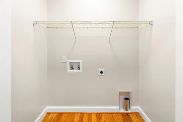 a bathroom with a shower and a shower head