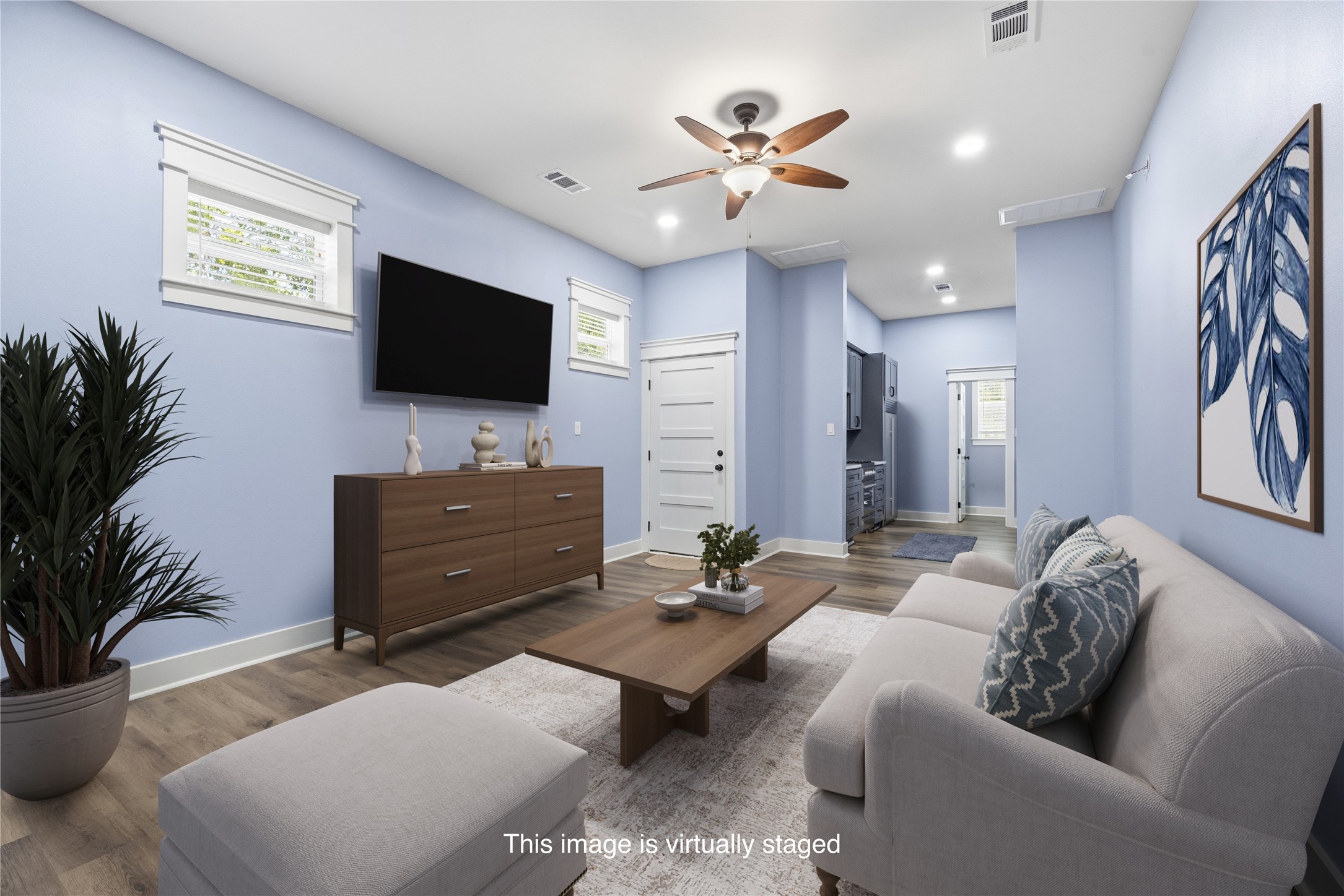 4607 Clayhead Road Richmond, TX 77406 - Photo 26 of 49 Spacious living room within the private living quarters featuring soaring ceilings, private entry access, and an open-concept layout designed for comfort.