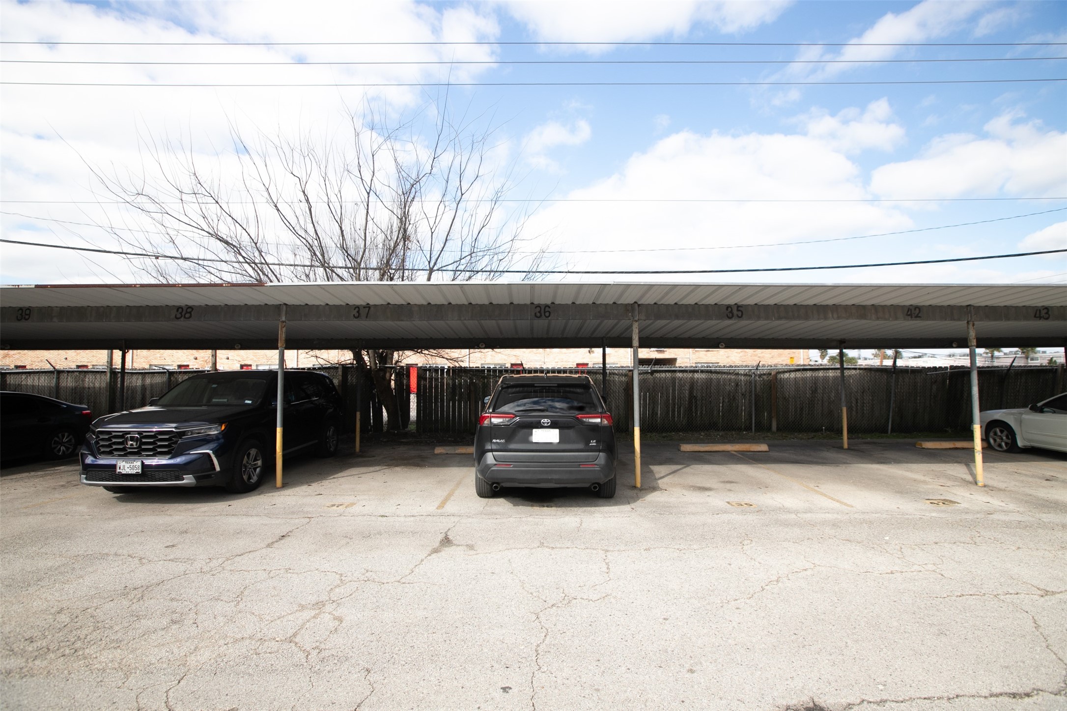 6201 Ranchester Drive, Unit 36 Houston, TX 77036 - Photo 23 of 23 a car parked in parking