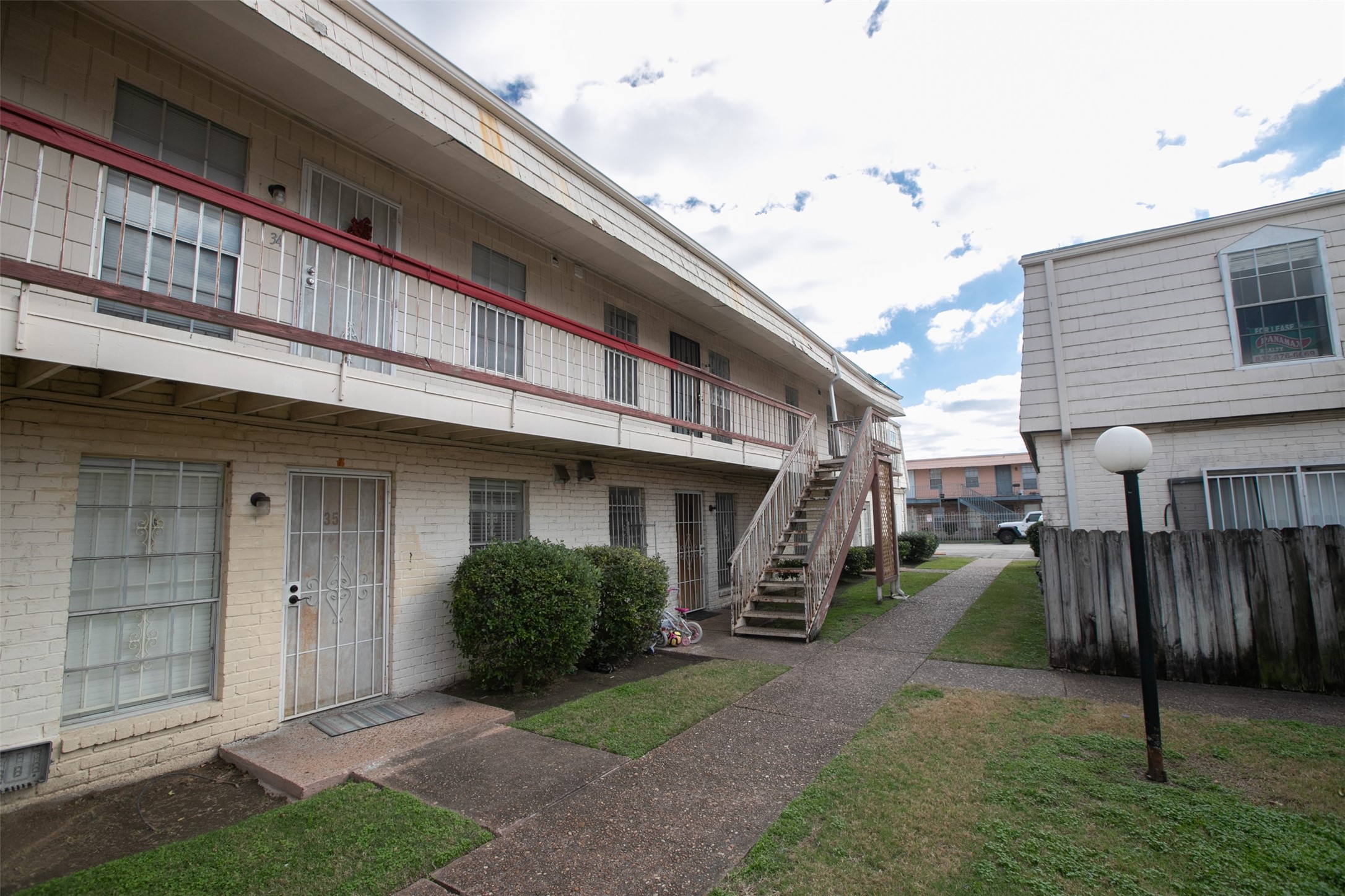 6201 Ranchester Drive, Unit 36 Houston, TX 77036 - Photo 3 of 23 a view of a house with a yard