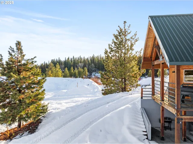 a view of swimming pool with a lake view