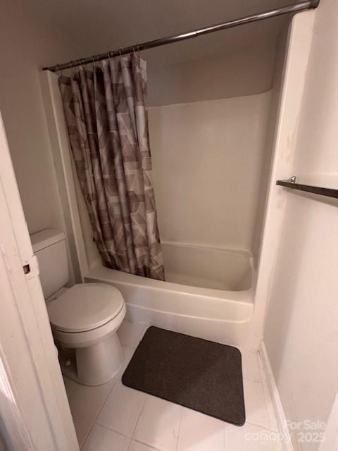 2227 Rexford Road Charlotte, NC 28211 - Photo 11 of 31 a bathroom with a toilet and a shower