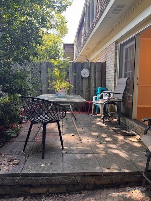 2227 Rexford Road Charlotte, NC 28211 - Photo 21 of 31 a view of a house with backyard porch and sitting area