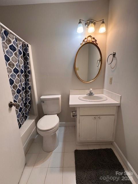 2227 Rexford Road Charlotte, NC 28211 - Photo 5 of 31 a bathroom with a toilet sink and mirror