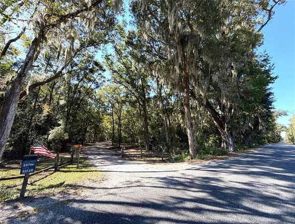 a view of a playground with basketball court