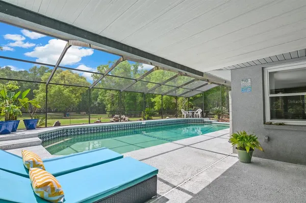 a view of a porch with a backyard