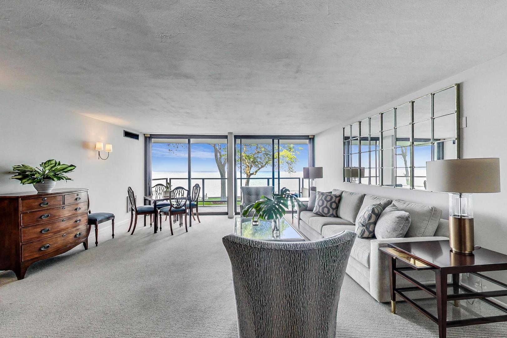 1630 Sheridan Road, Unit 8B Wilmette, IL 60091 - Photo 41 of 45 a living room with furniture and a table