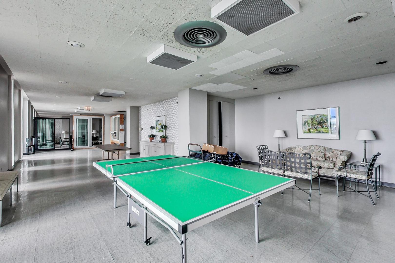 1630 Sheridan Road, Unit 8B Wilmette, IL 60091 - Photo 43 of 45 a room with pool table and windows