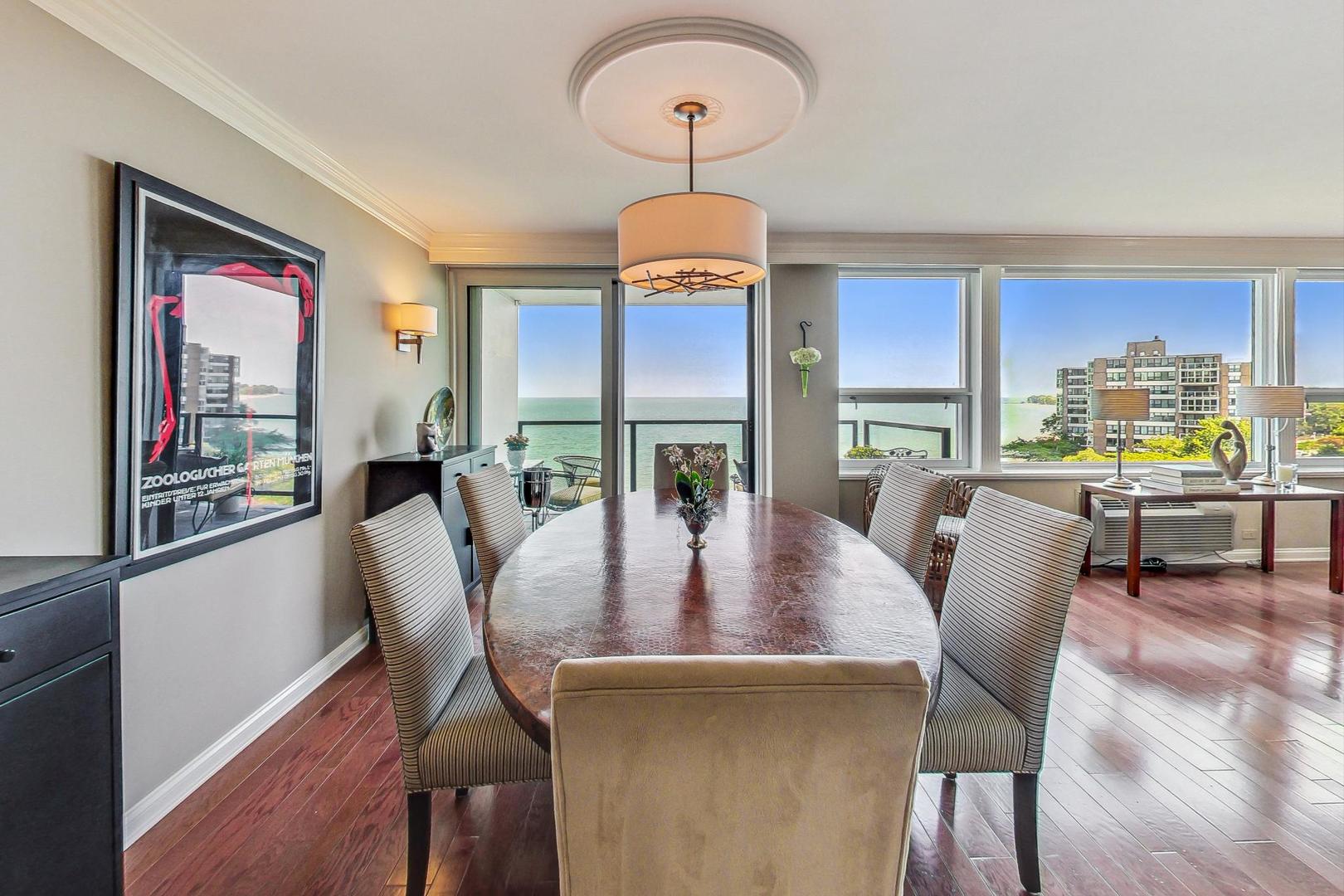 1630 Sheridan Road, Unit 8B Wilmette, IL 60091 - Photo 9 of 45 a view of a dining room with furniture window and wooden floor