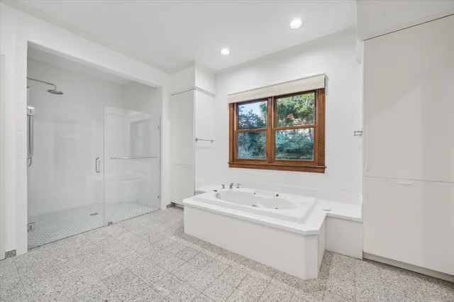 a bathroom with a sink and a bathtub