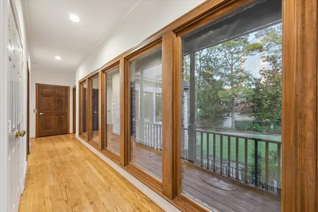 a view of hallway with a large window
