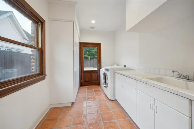 a bathroom with a sink a vanity and a mirror