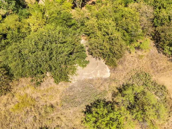 a view of a house with a street