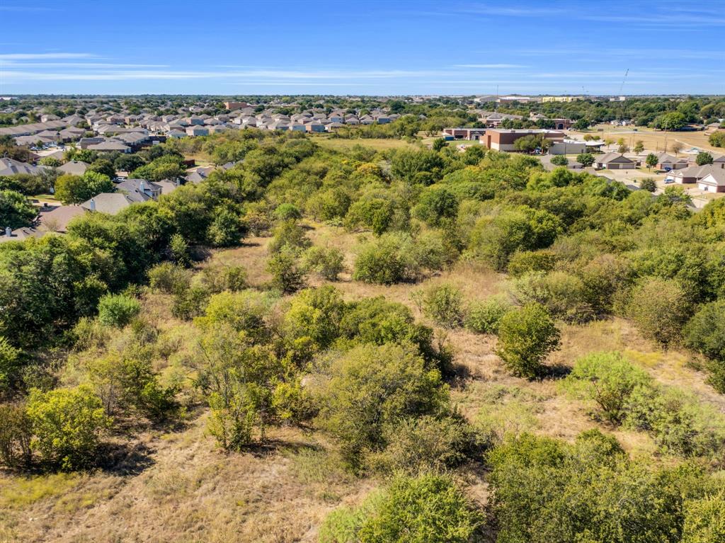 485 South Magnolia Street Crowley, TX 76036 - Photo 9 of 21 a view of a green field