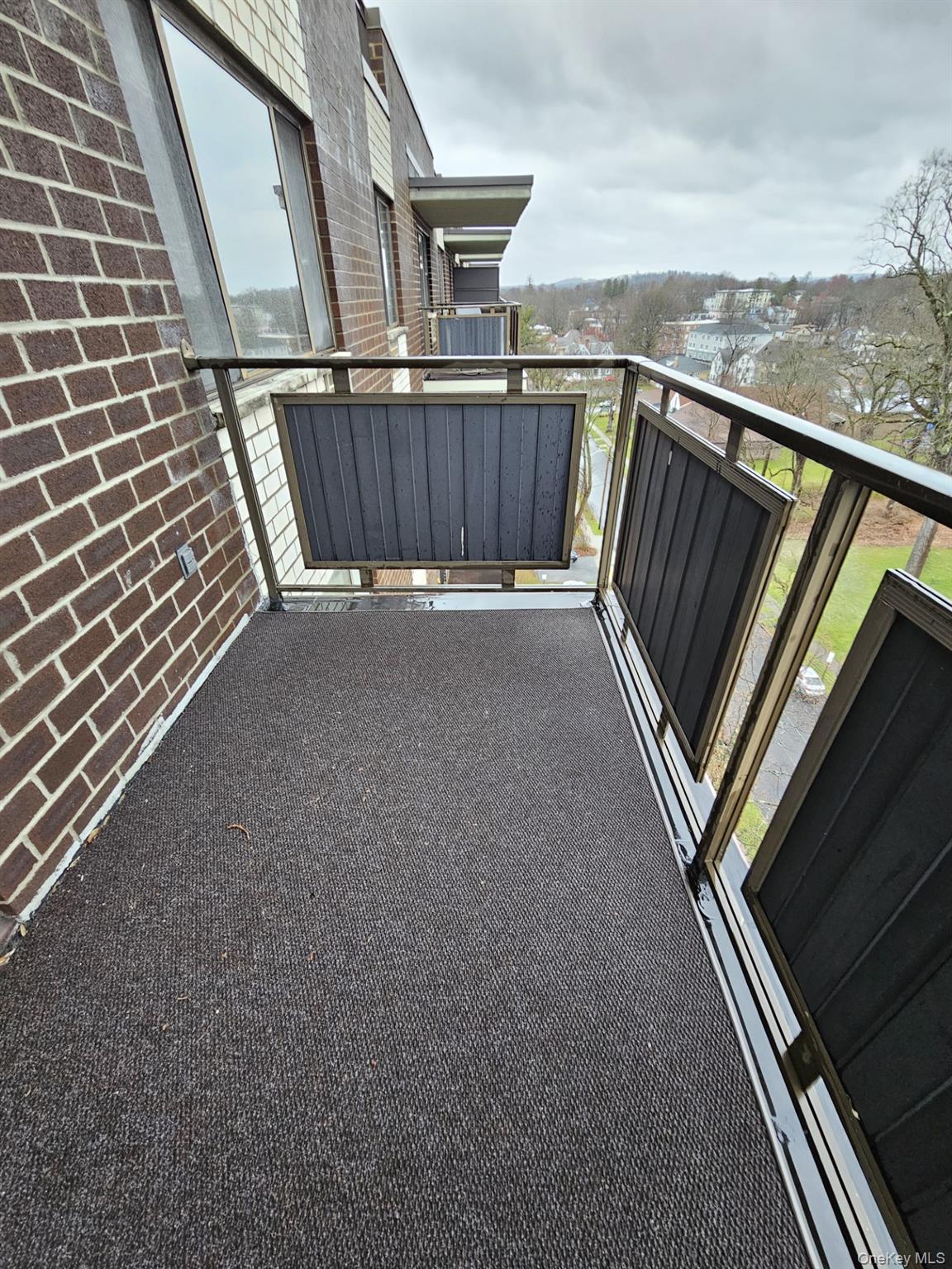 160 Academy Street, Unit 3N Poughkeepsie, NY 12601 - Photo 6 of 8 a view of balcony with furniture
