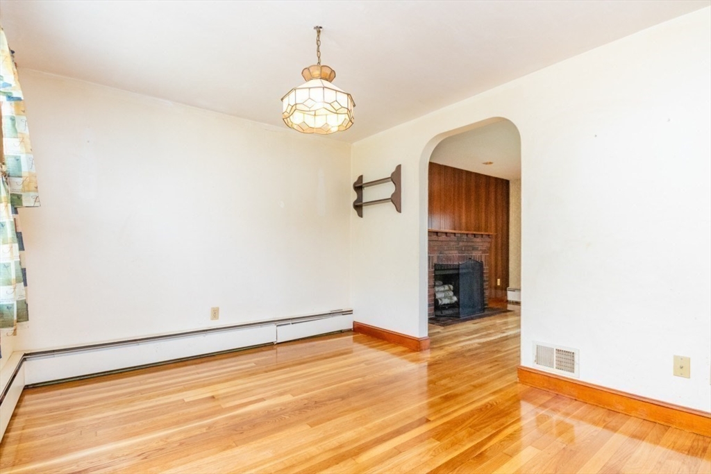 5 Edward Street Canton, MA 02021 - Photo 11 of 24 a view of an empty room with wooden floor