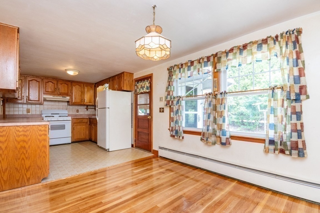 5 Edward Street Canton, MA 02021 - Photo 13 of 24 a view of kitchen with furniture and large window