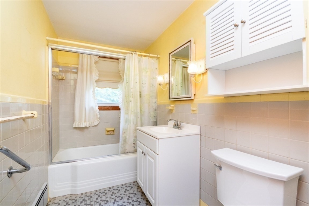 5 Edward Street Canton, MA 02021 - Photo 16 of 24 a bathroom with a sink a toilet and a bathtub