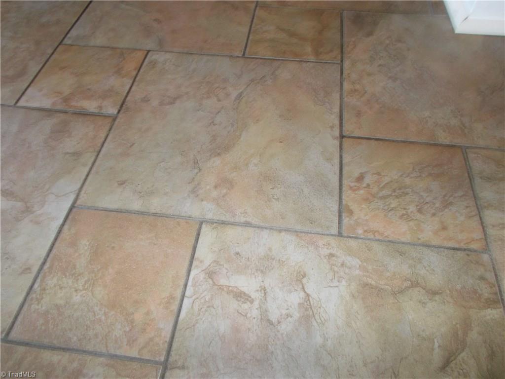2790 WaterStone Loop High Point, NC 27265 - Photo 20 of 24 Upgraded flooring throughout the home. These are beautiful Ceramic Tile floors in the kitchen