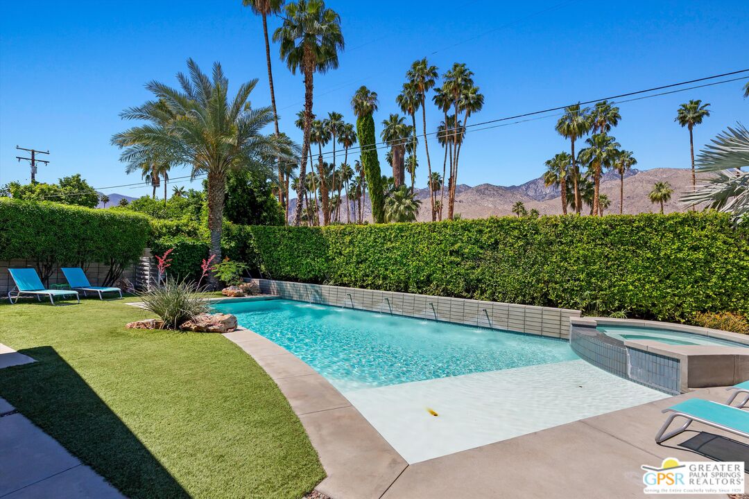 1349 Sagebrush Road Palm Springs, CA 92264 - Photo 29 of 61 a view of a backyard with a garden