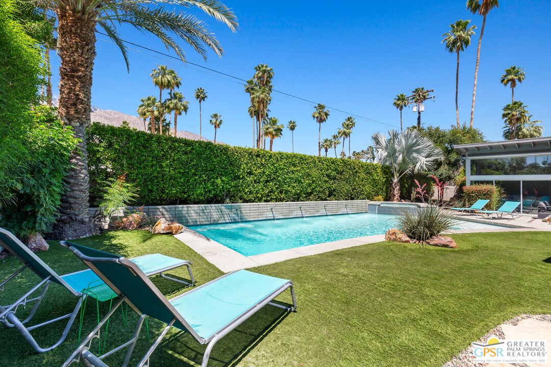 1349 Sagebrush Road Palm Springs, CA 92264 - Photo 31 of 61 a view of a swimming pool with a yard